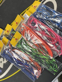 a bunch of different colored fishing line in a plastic bag